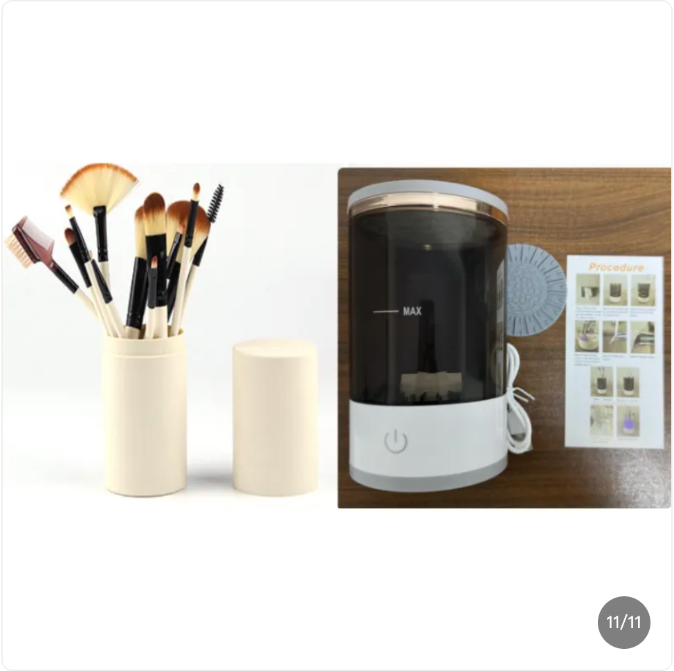 Makeup brushes in a holder next to a humidifier on a wooden surface.